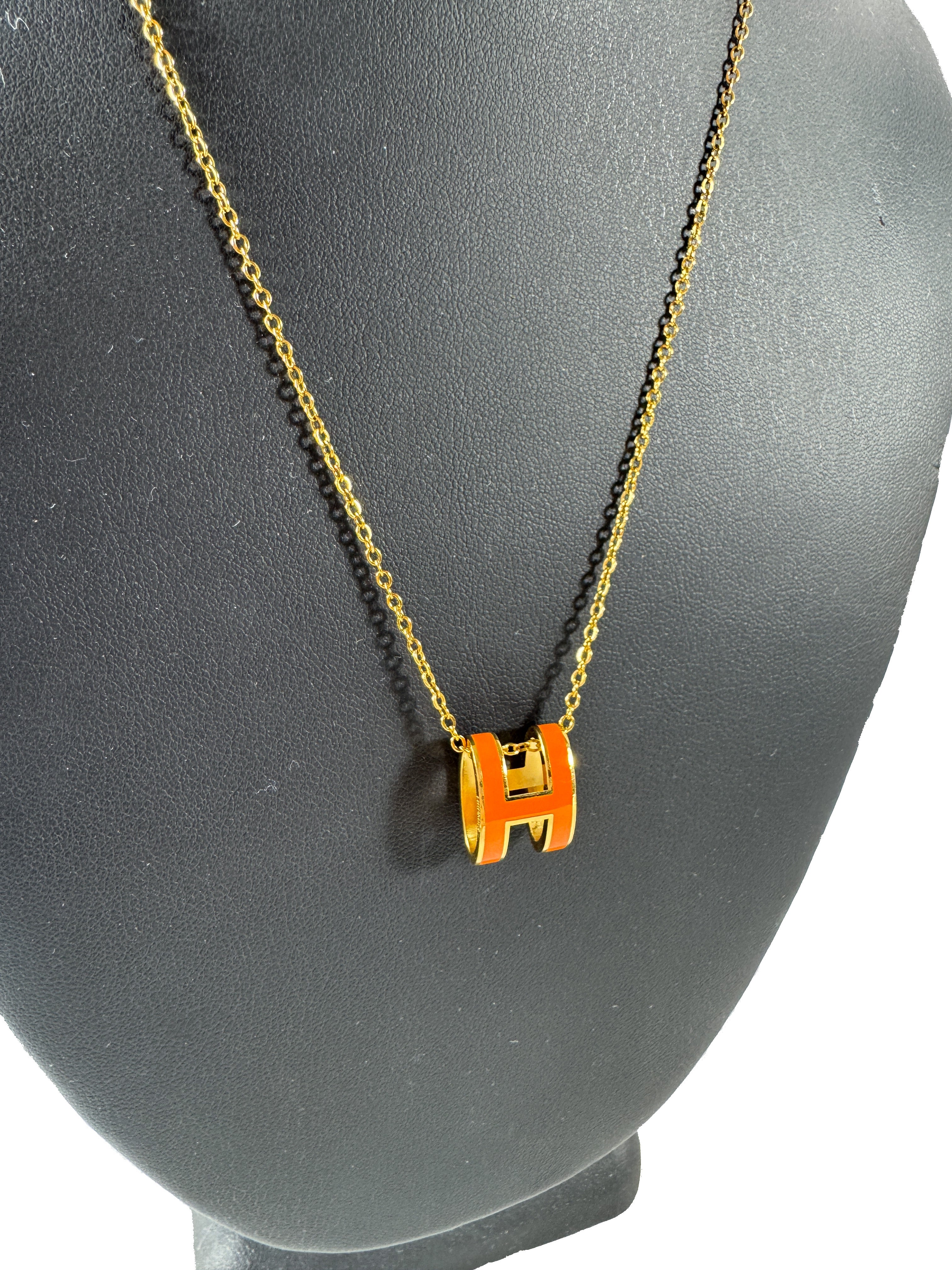 Hermès orange Pop H necklace