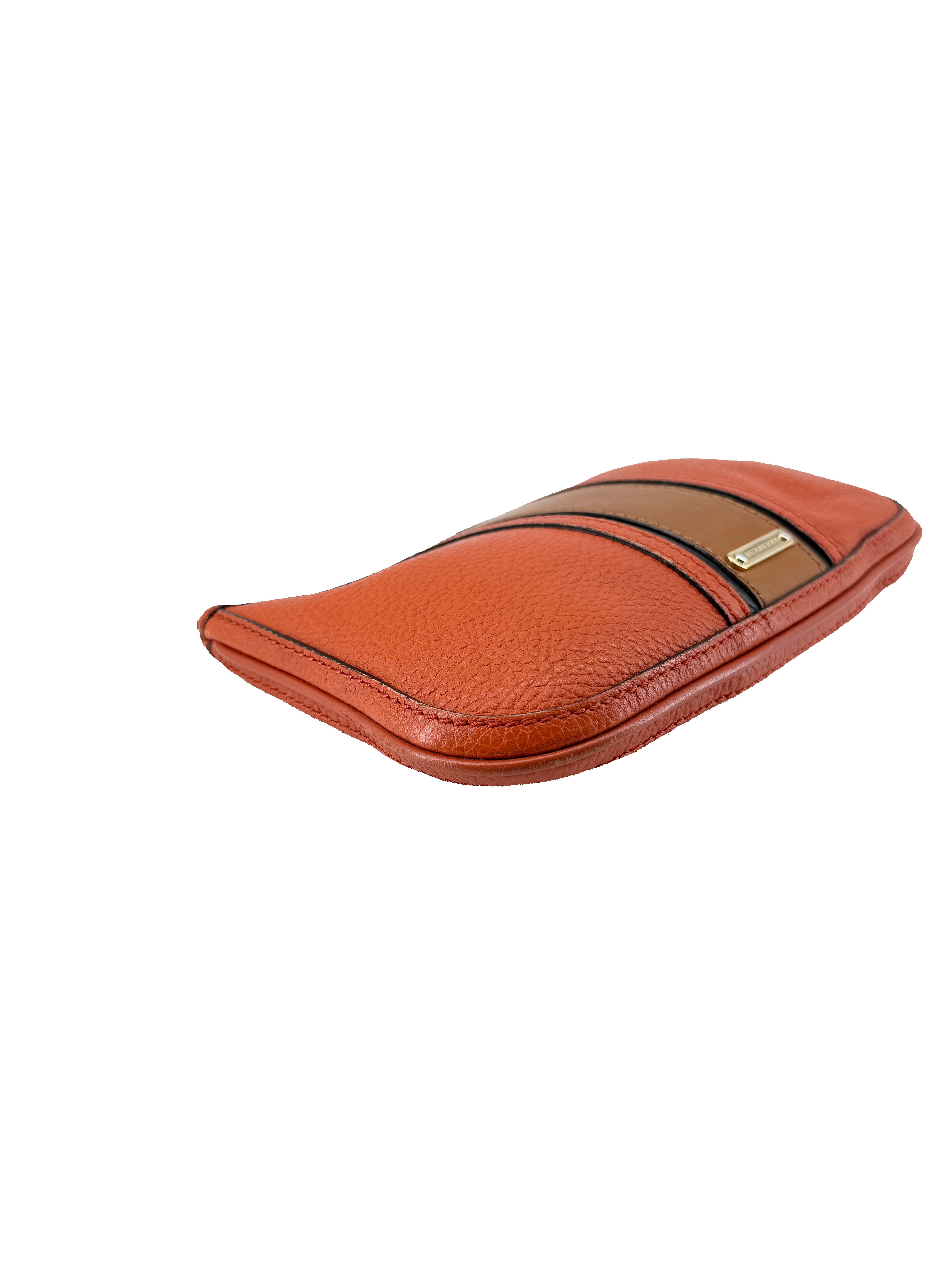Burberry orange leather wristlet