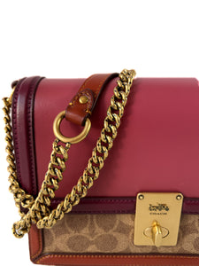 Coach pink, purple, and brown sig. leather Hutton bag C2795