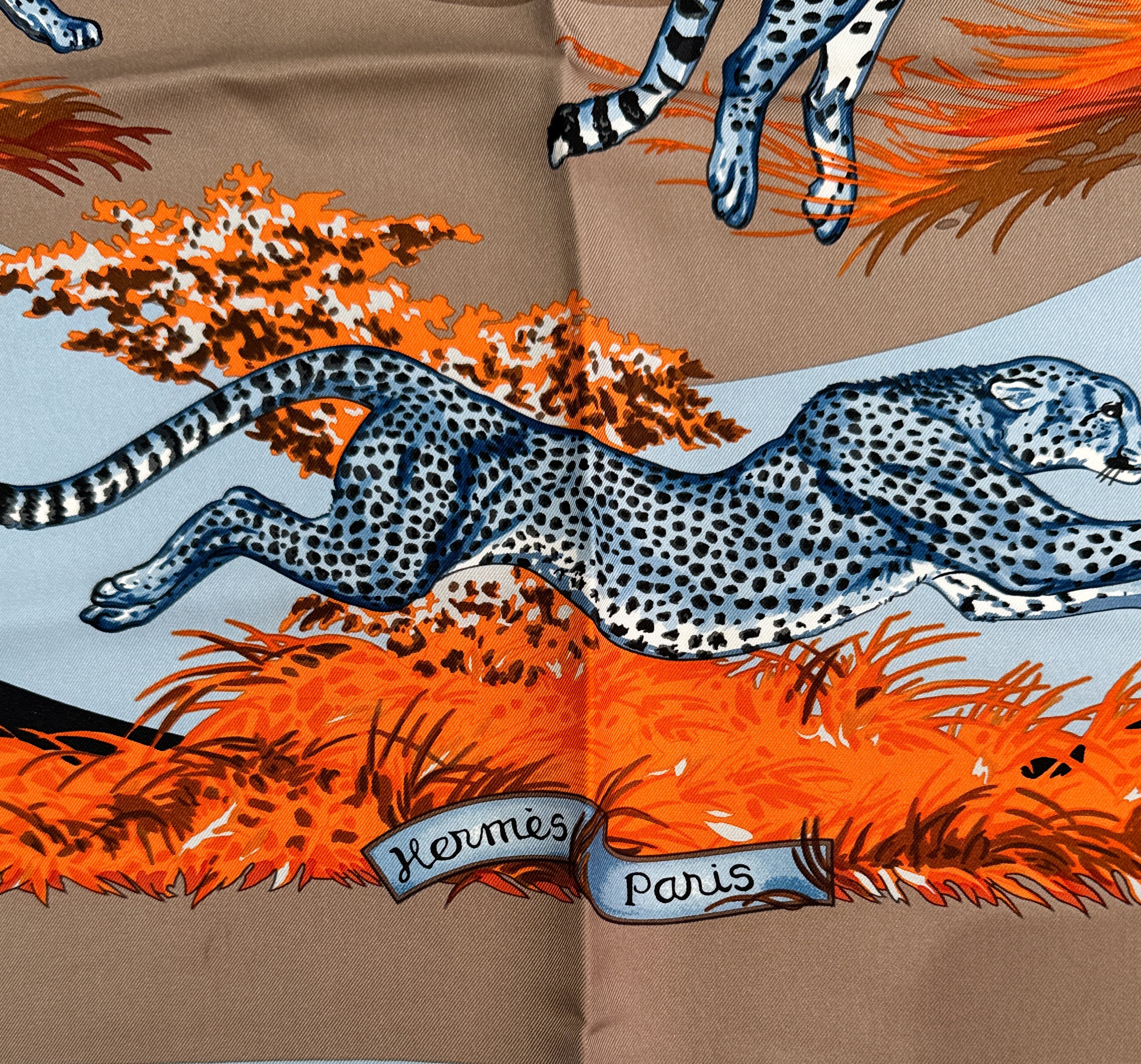 Hermès carre 90cm blue, orange, taupe guepards silk scarf