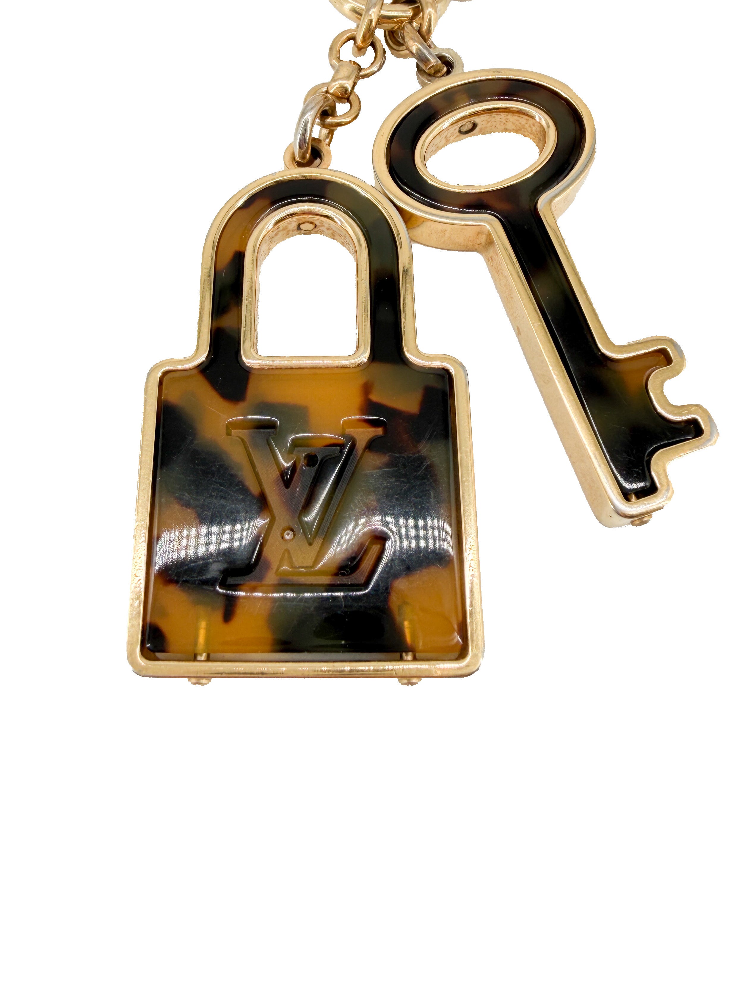 Louis Vuitton tortoise Porte Cles Confidence bag charm OB0112