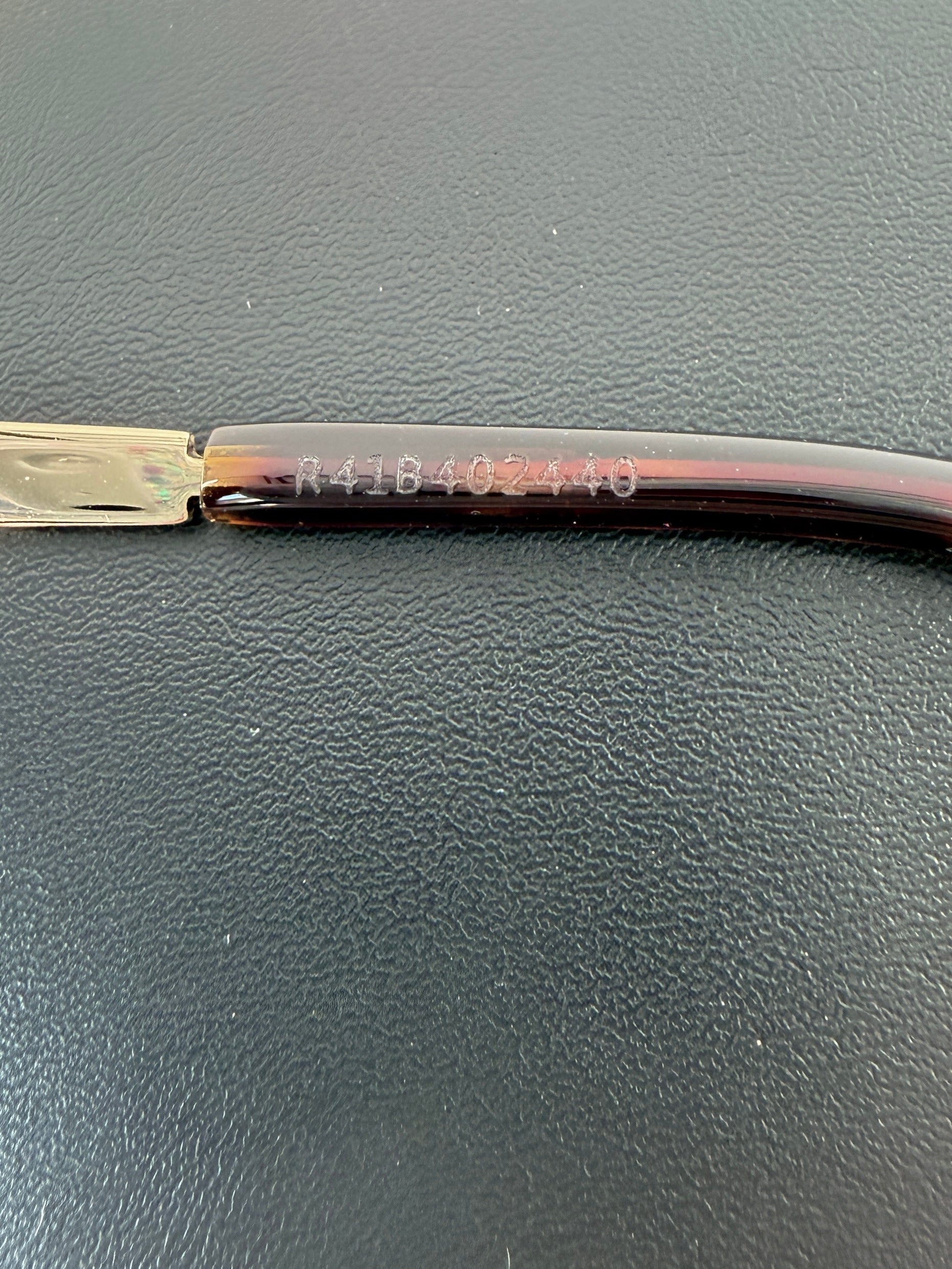 Saint Laurent gold tone oval sunglasses SL 692 R41B402440