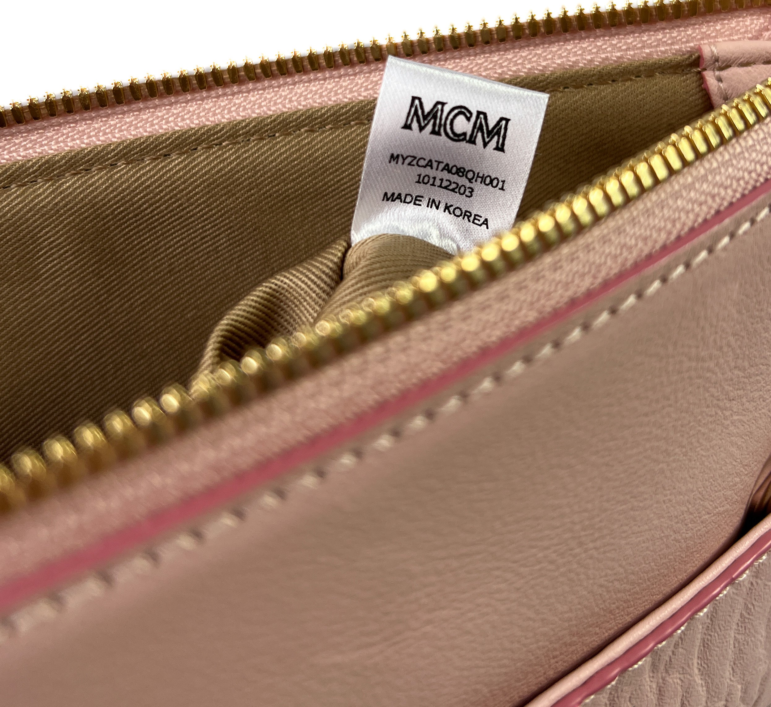 MCM pink visetos slim pouch crossbody