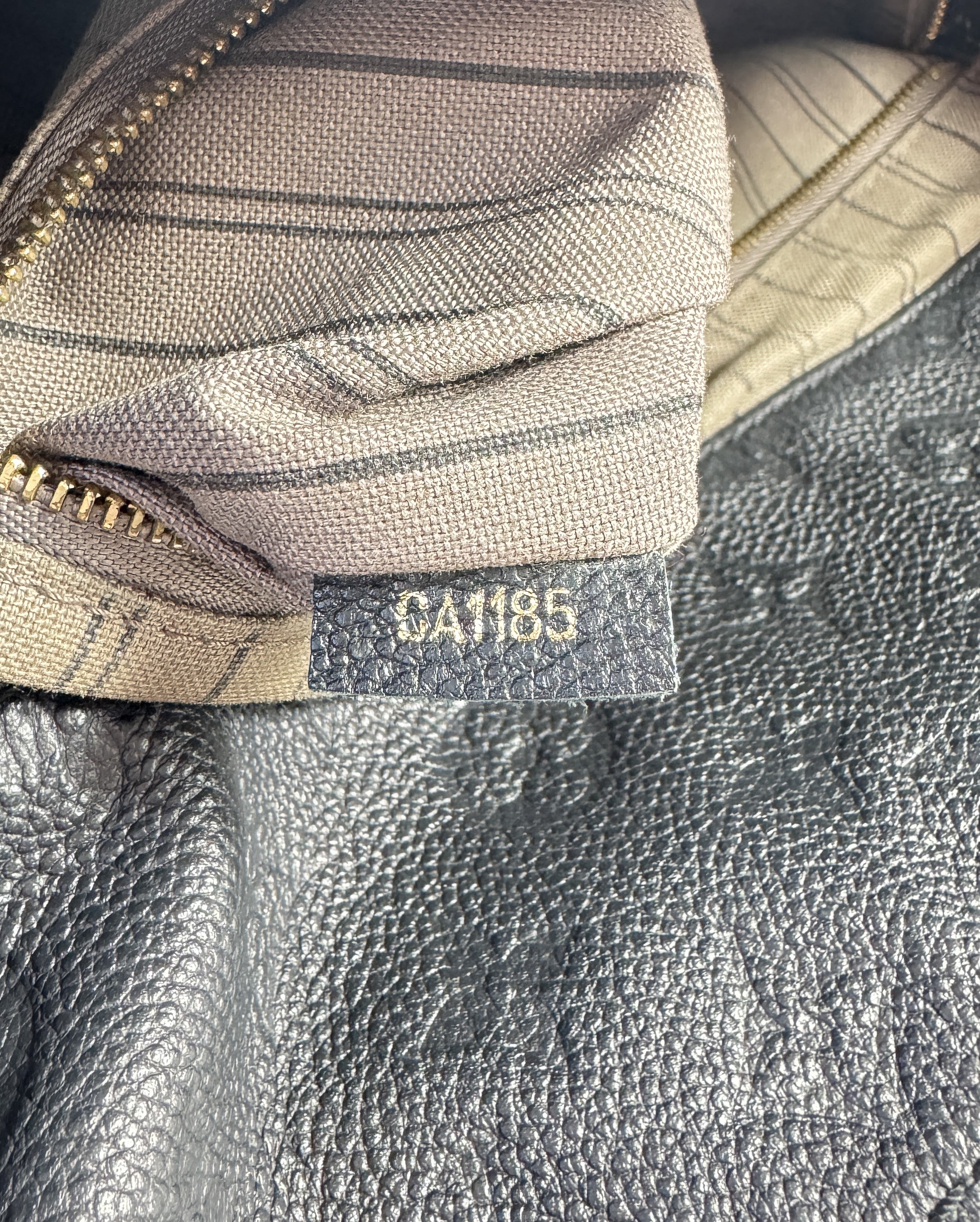 Louis Vuitton monogram black empreinte Artsy MM CA1185