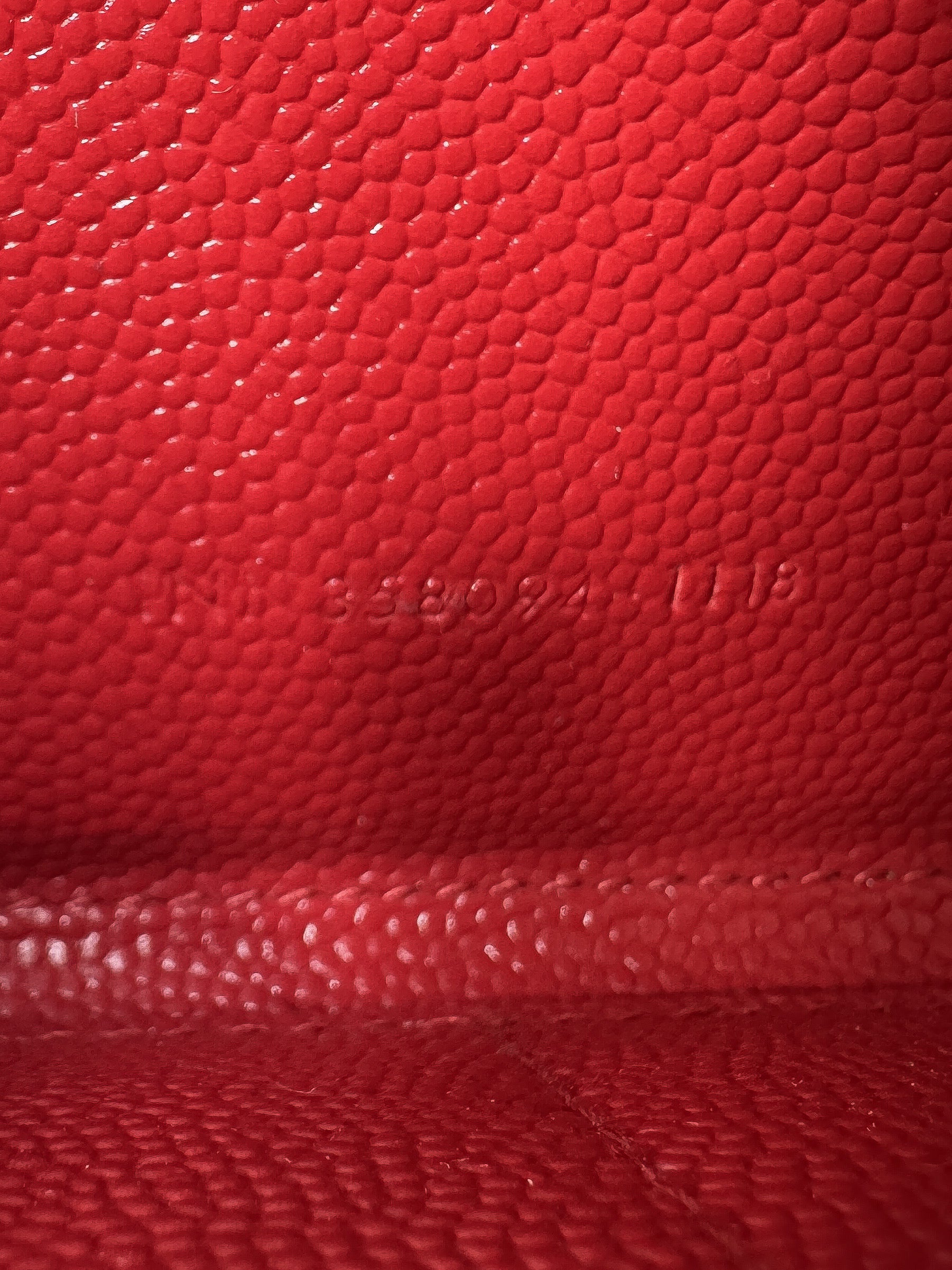 Saint Laurent red grain de poudre matelasse chevon monogram zip around wallet INN3580941118