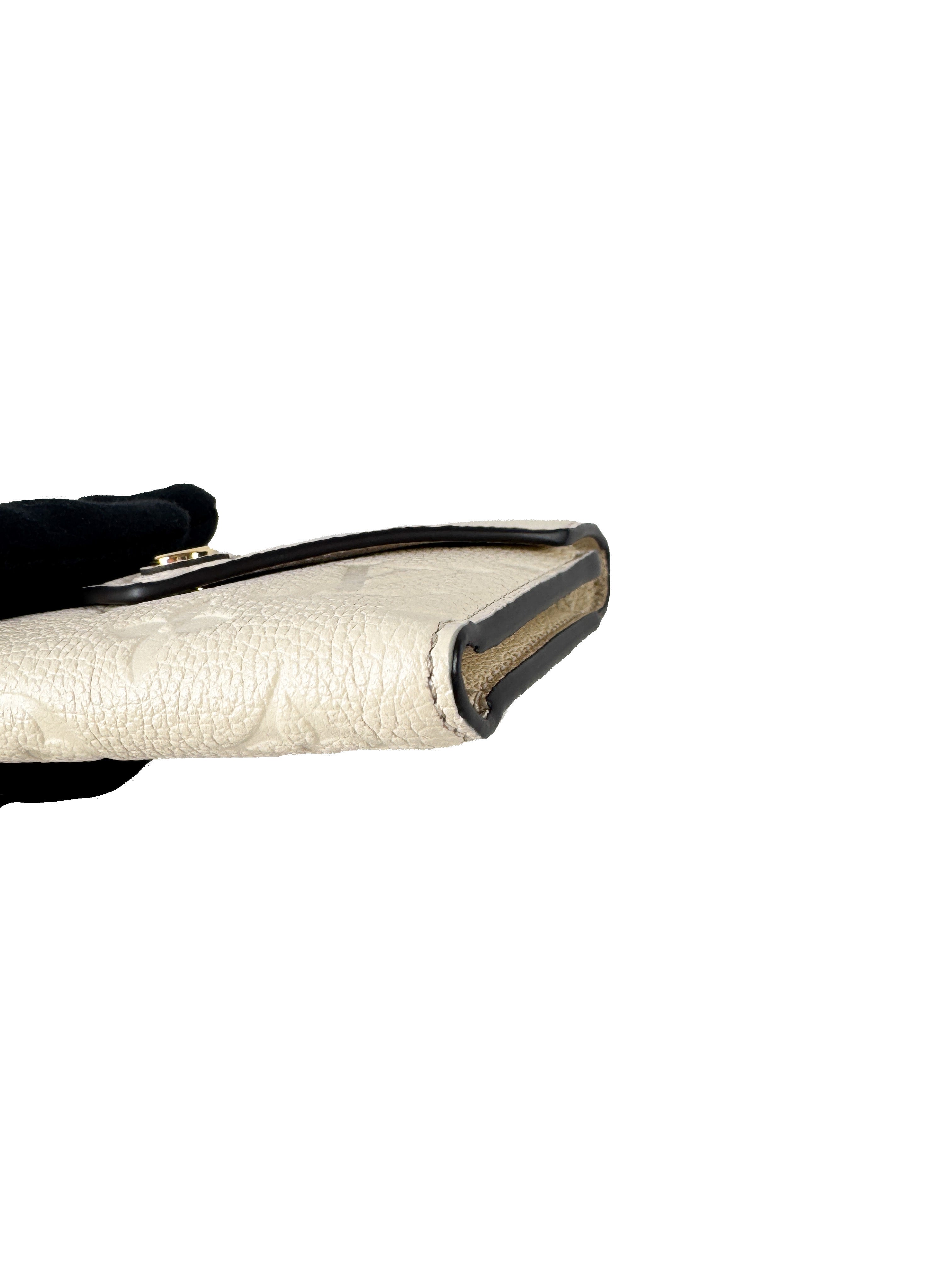 Louis Vuitton cream empreinte leather Giant monogram Victorine wallet (NFC)