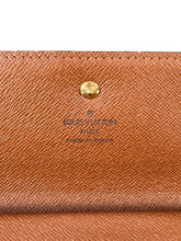 Louis Vuitton monogram porte tresor trifold international wallet MB0063