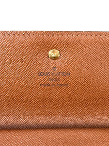 Louis Vuitton monogram porte tresor trifold international wallet MB0063