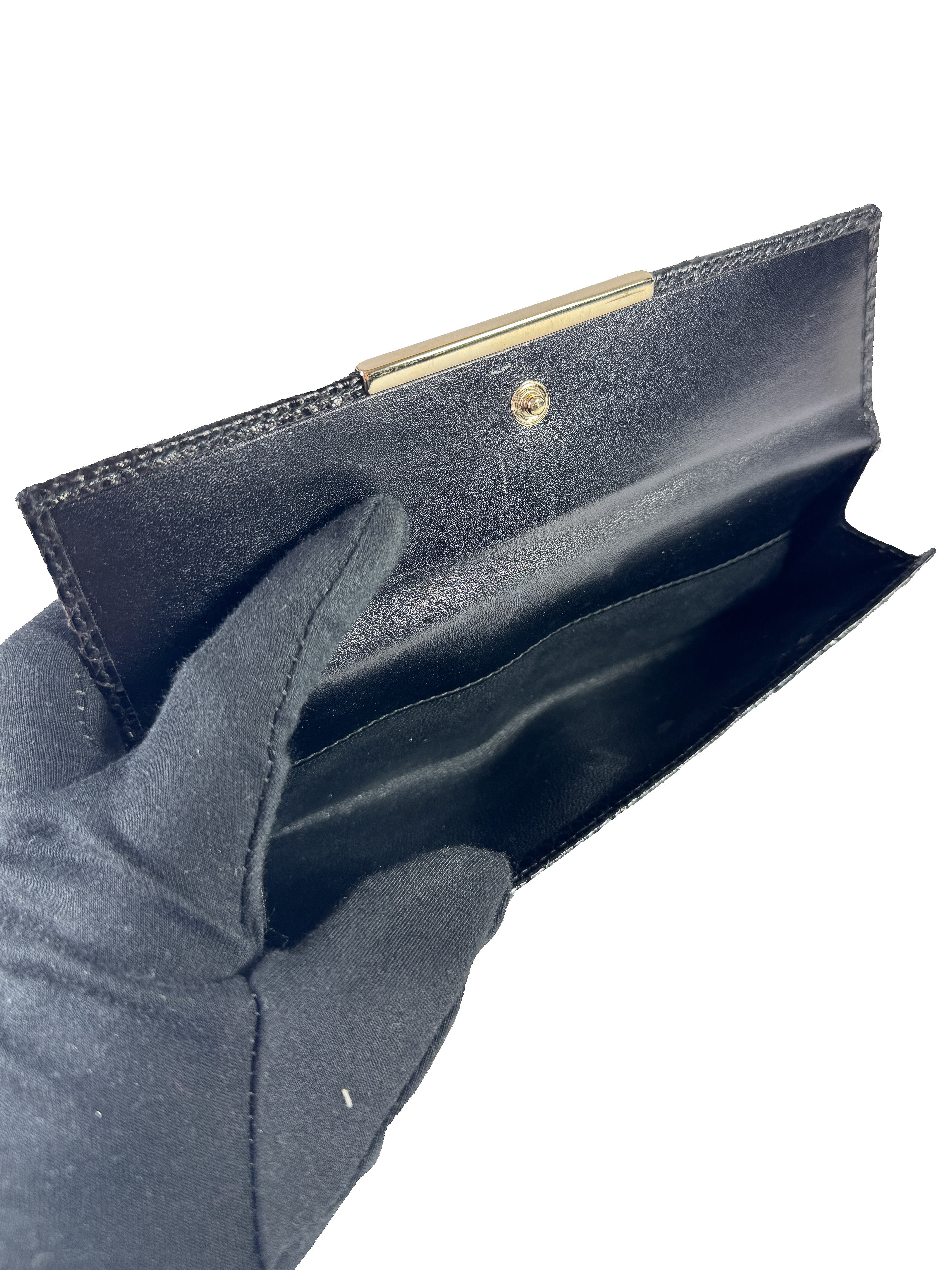 Gucci black embossed leather wallet 2067