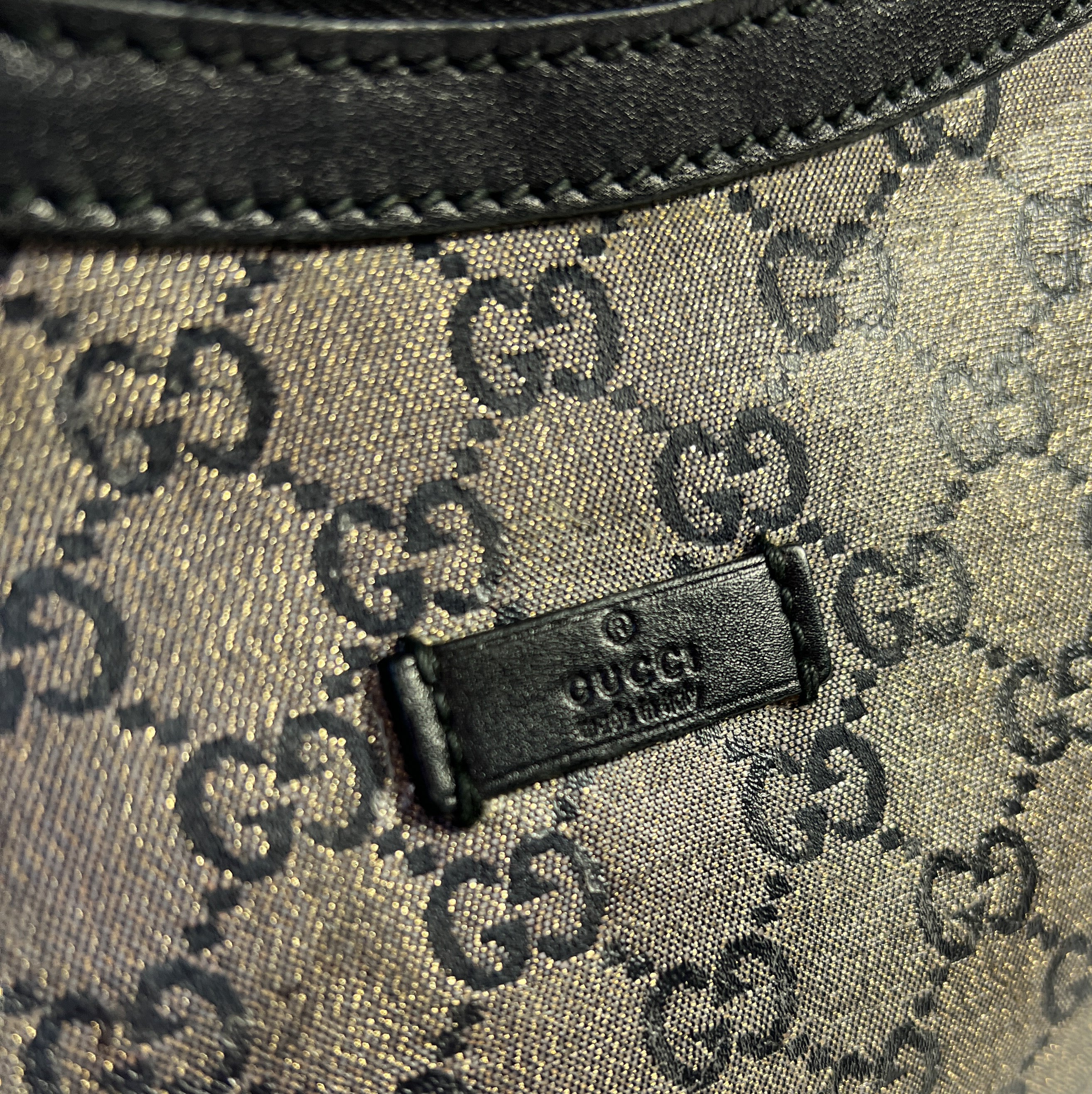 Gucci black and gold GG crossbody