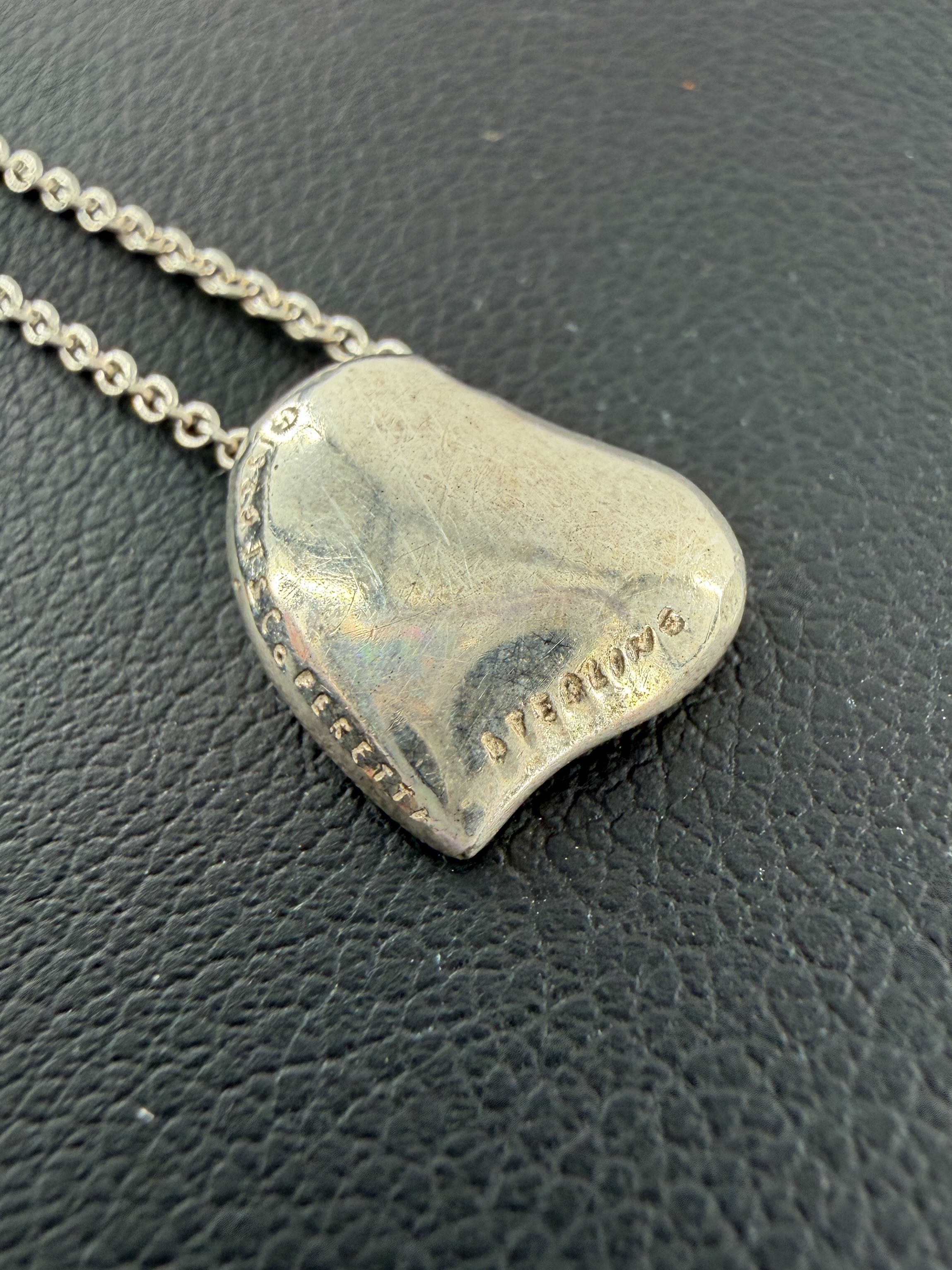 Tiffany & Co Elsa Peretti sterling silver carved heart necklace