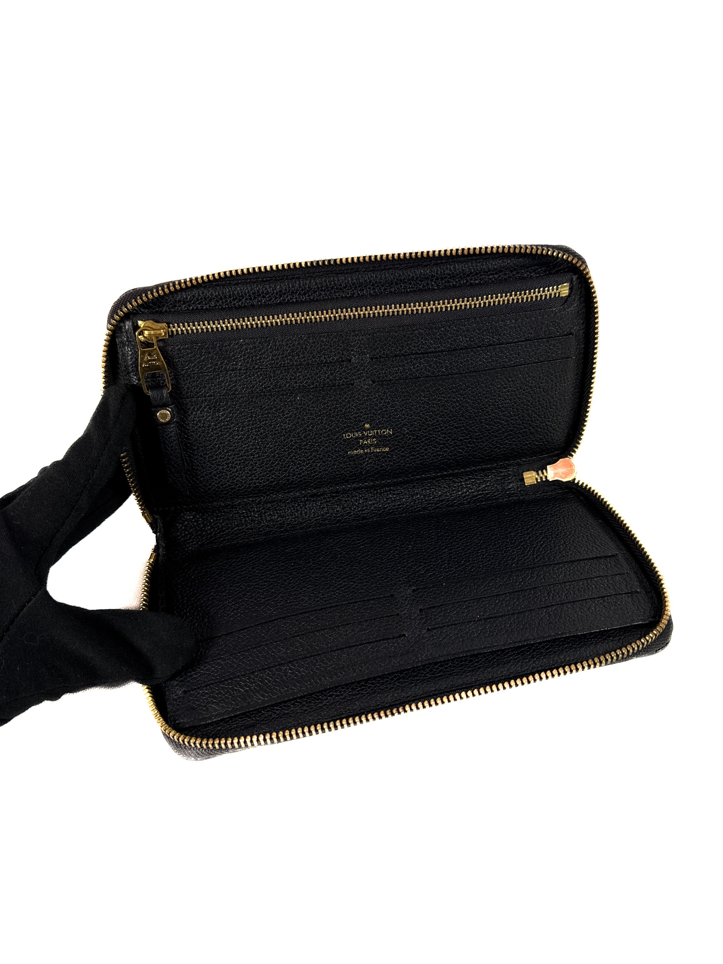 Louis Vuitton black empreinte leather zippy wallet TS1162