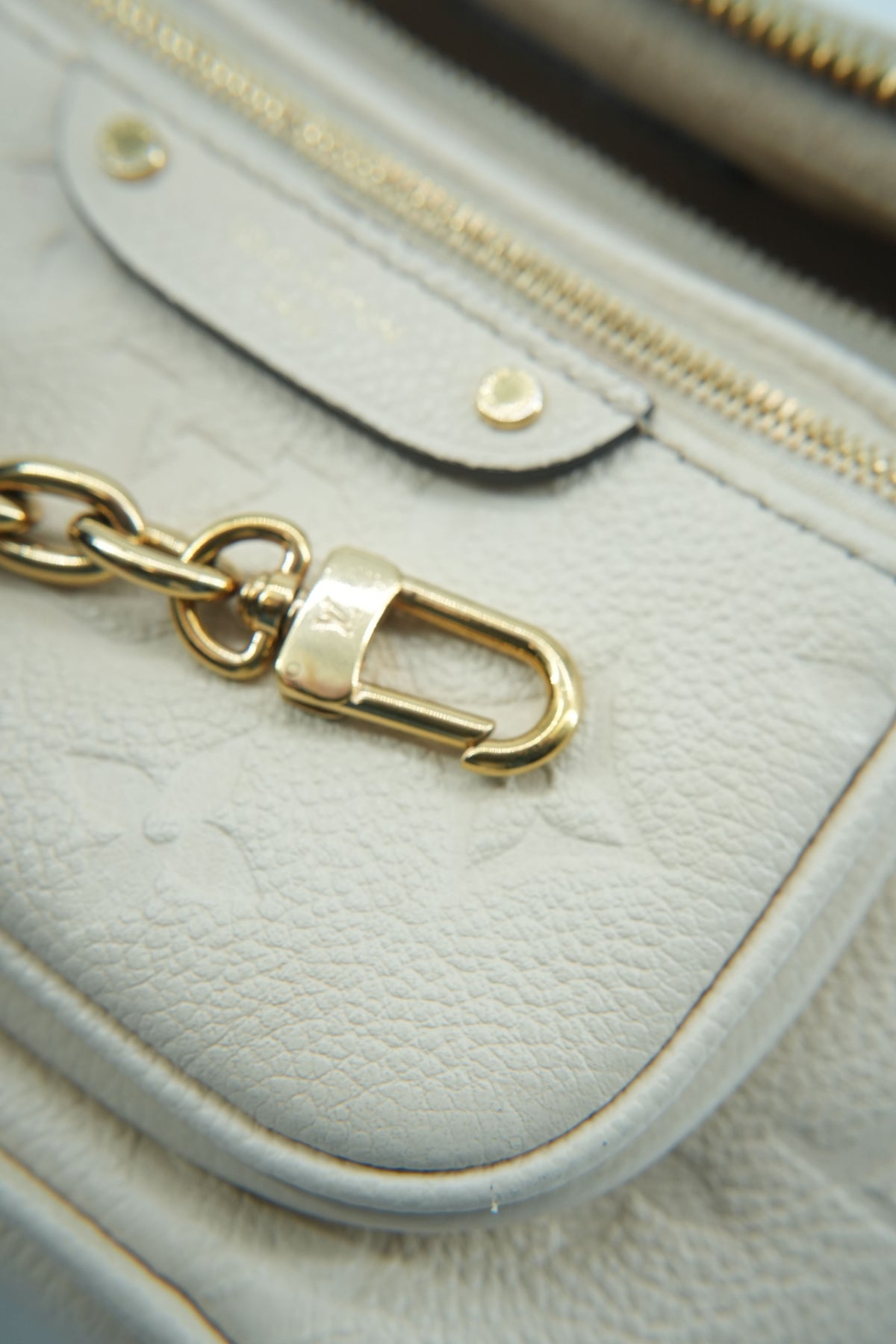 Louis Vuitton cream empreinte mini bumbag NFC