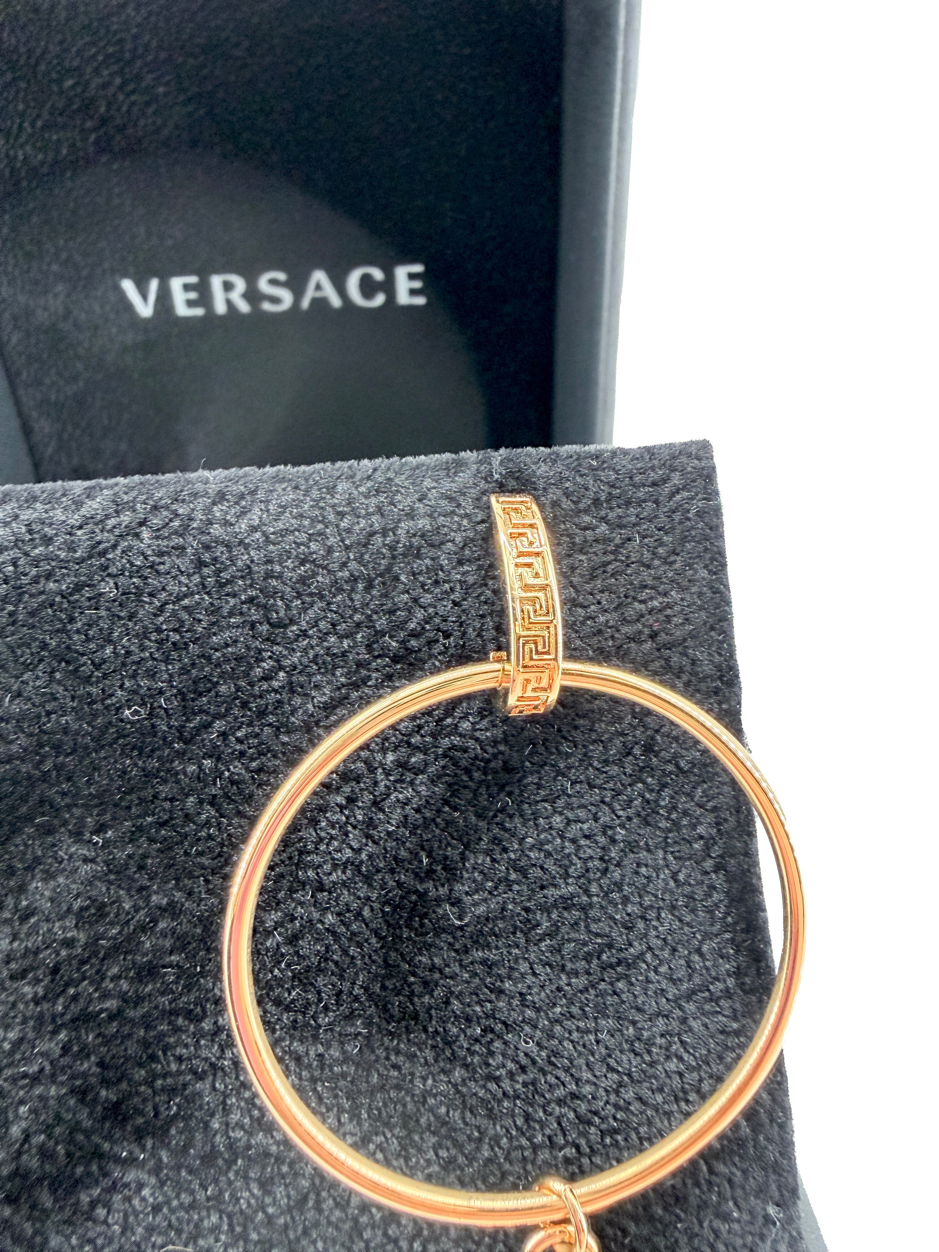 Versace gold tone Tribute Medusa charm hoop earrings