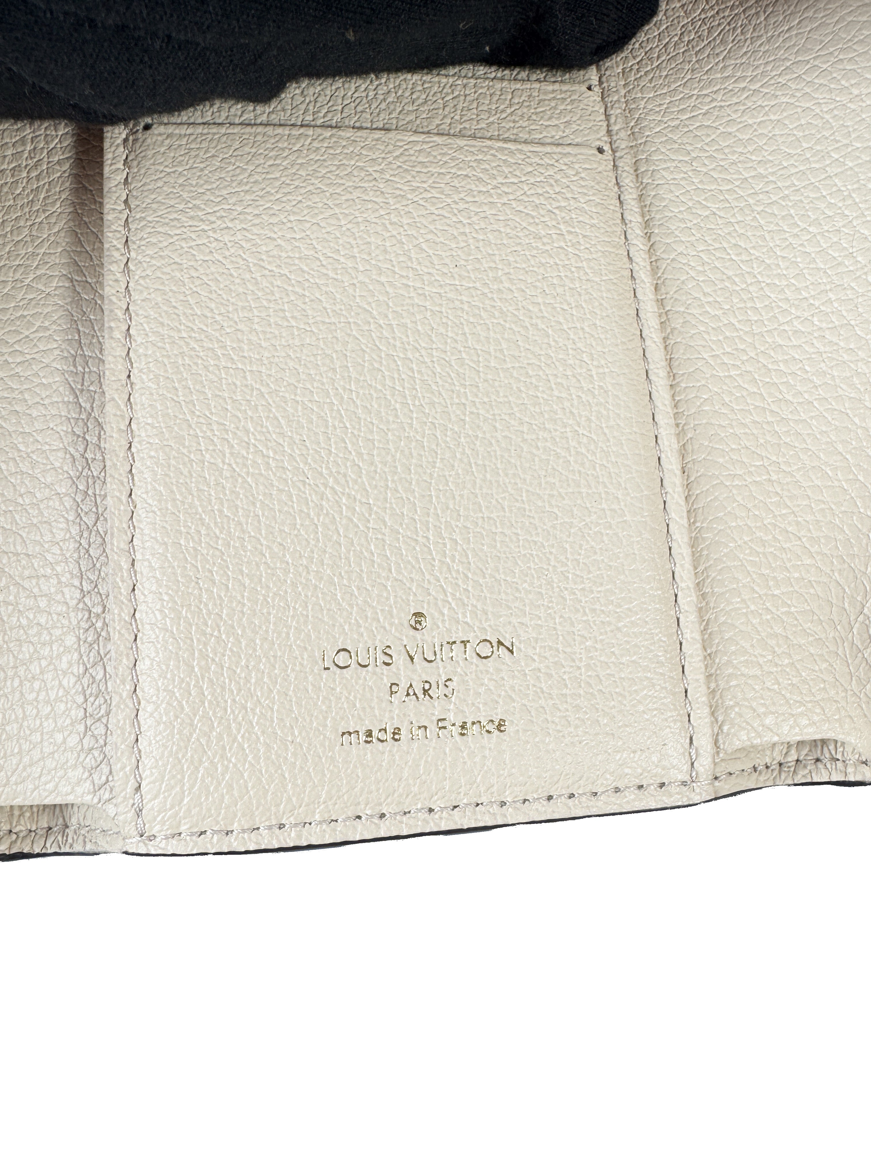 Louis Vuitton cream empreinte leather Giant monogram Victorine wallet (NFC)