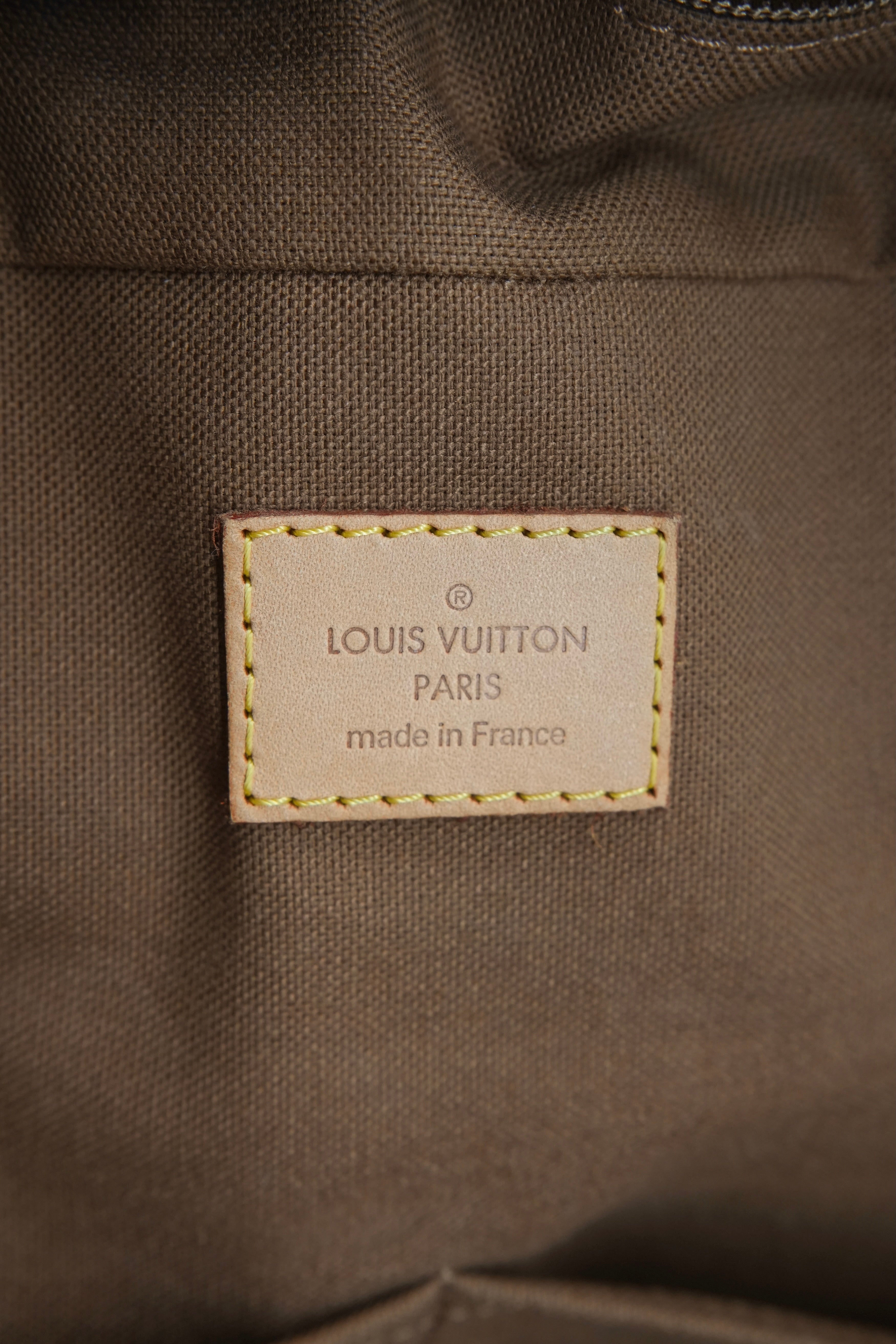Louis Vuitton monogram Eole rolling duffle FL2048
