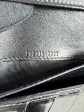 Gucci black embossed leather wallet 2067