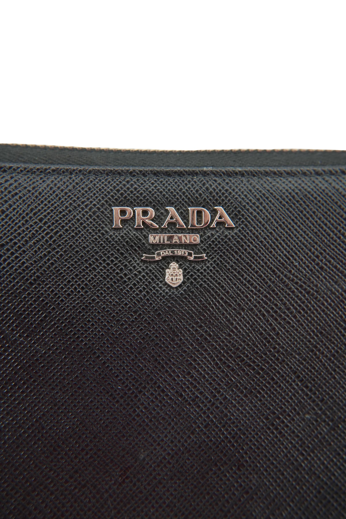 Prada black leather saffiano leather zip around 42