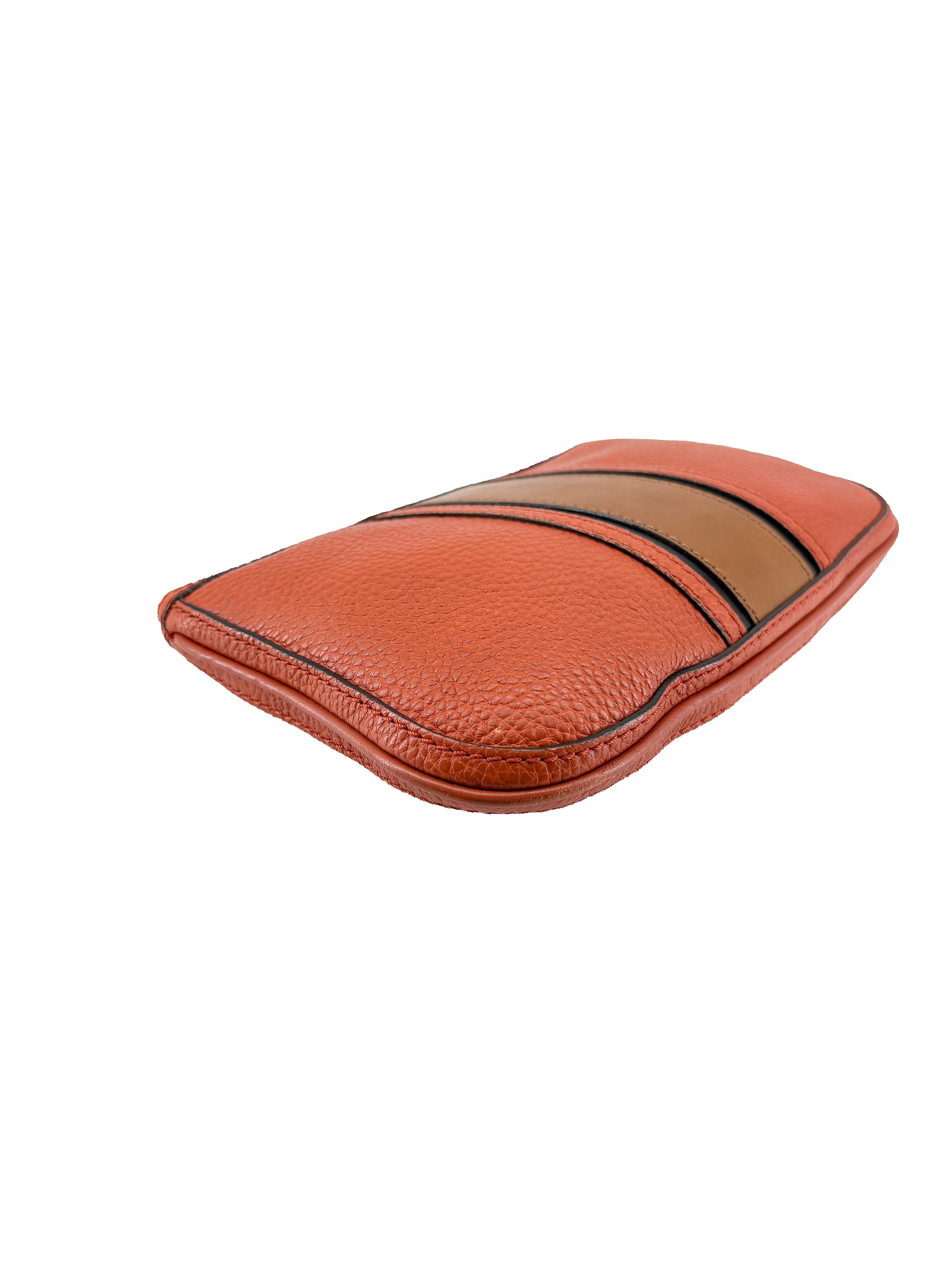 Burberry orange leather wristlet