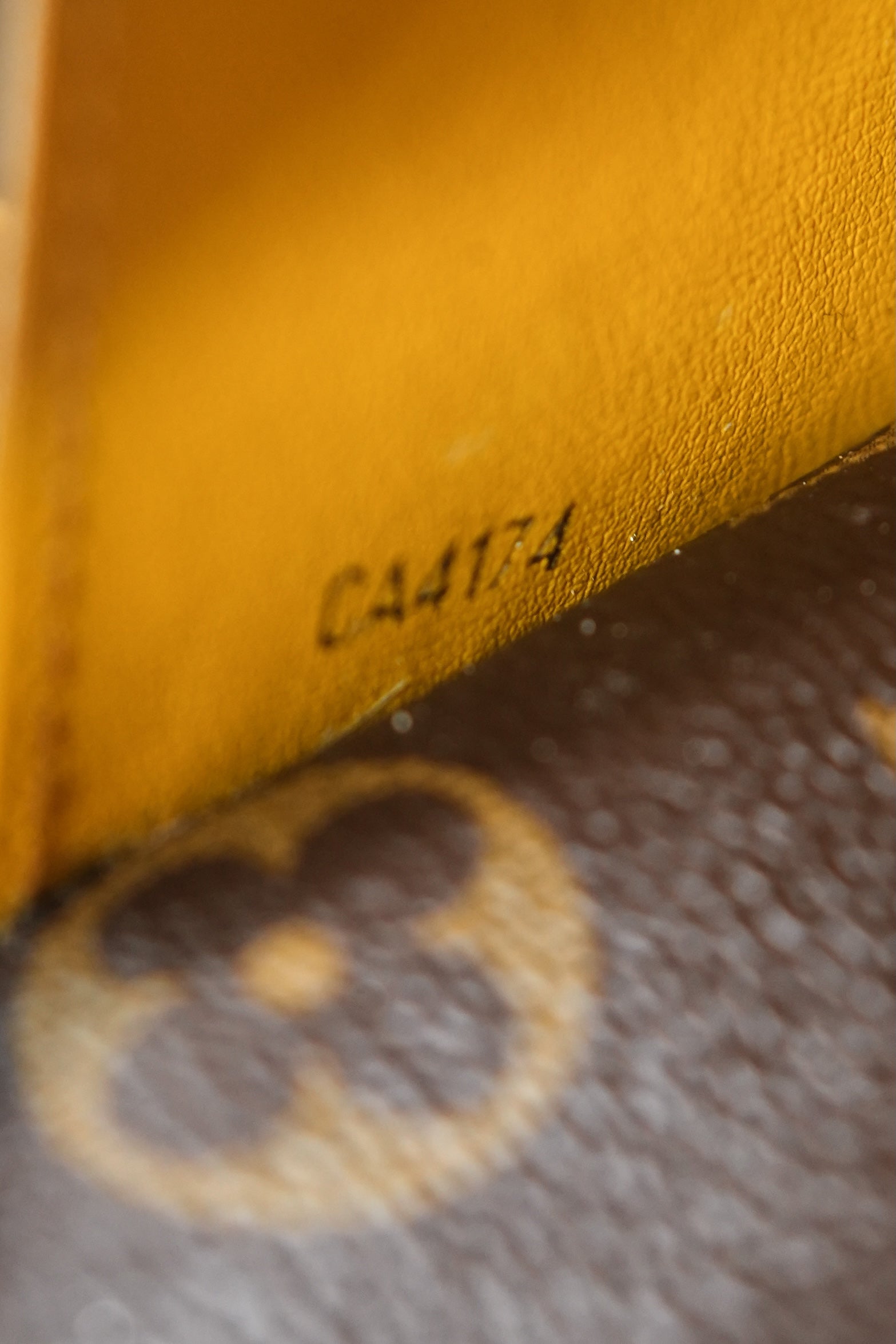 Louis Vuitton brown, yellow Emilie wallet CA4174