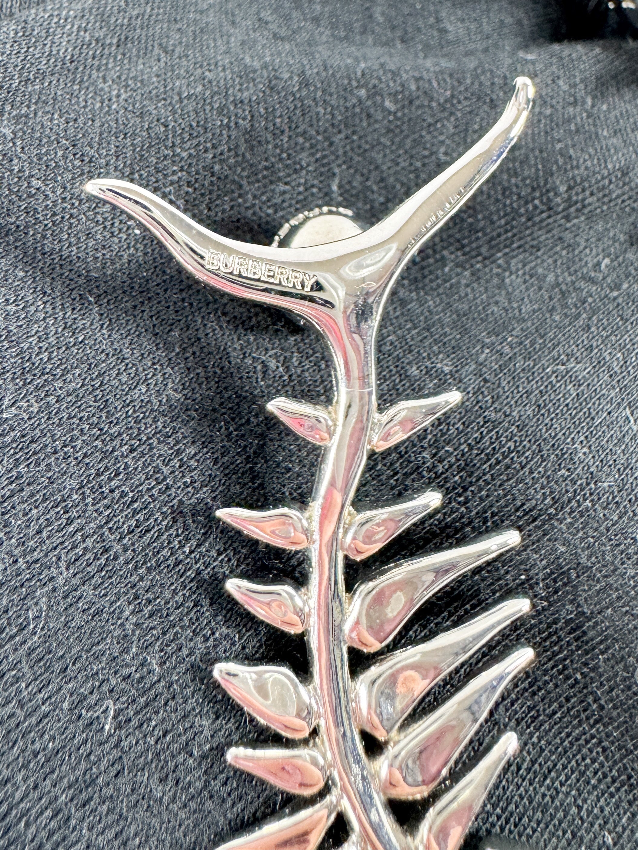 Burberry fishbone silver tone earrings