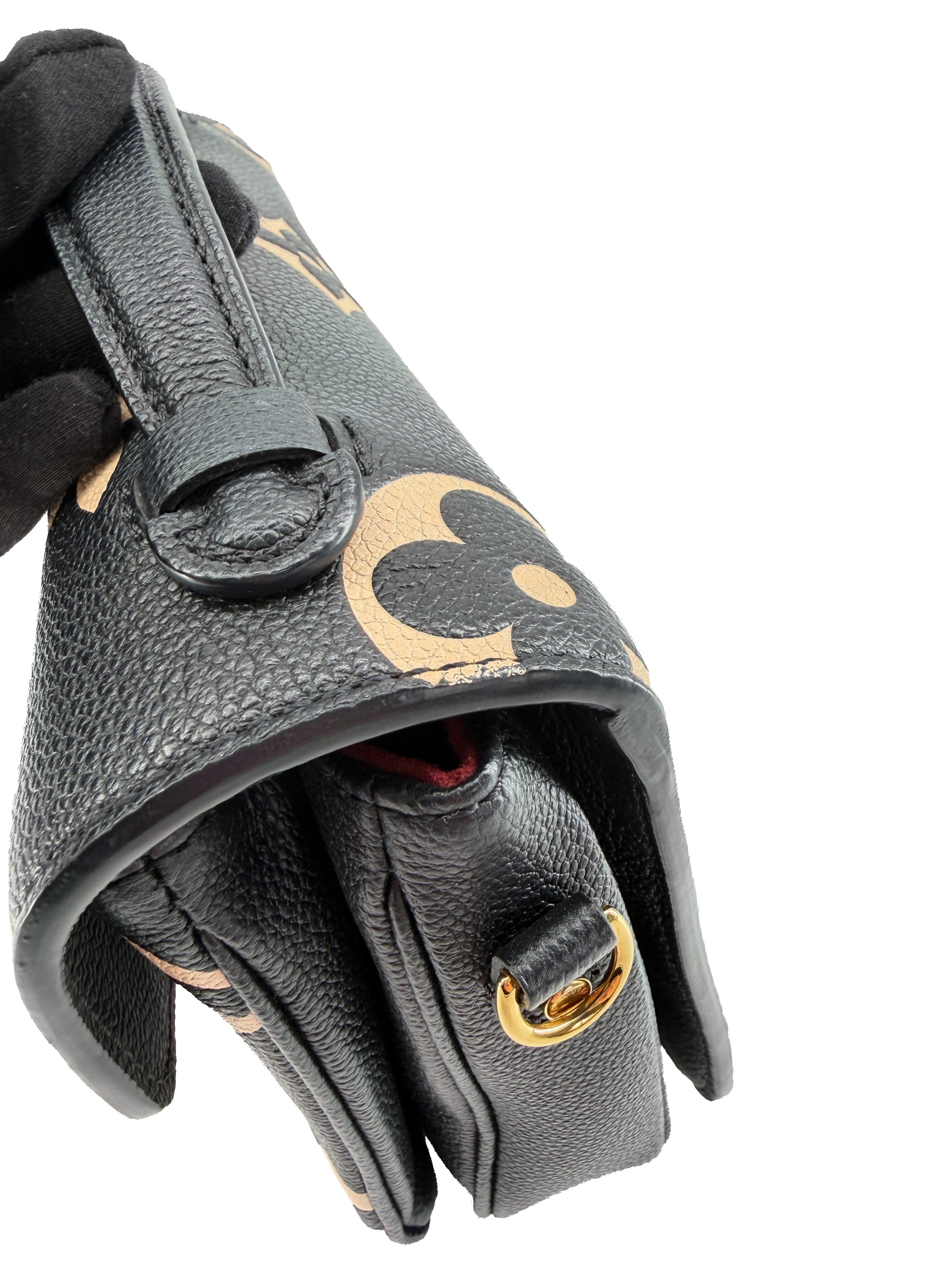 Louis Vuitton black, cream empreinte leather Pochette Metis DU5210