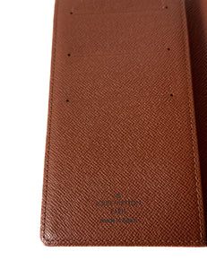 Louis Vuitton monogram vertical wallet CA0060