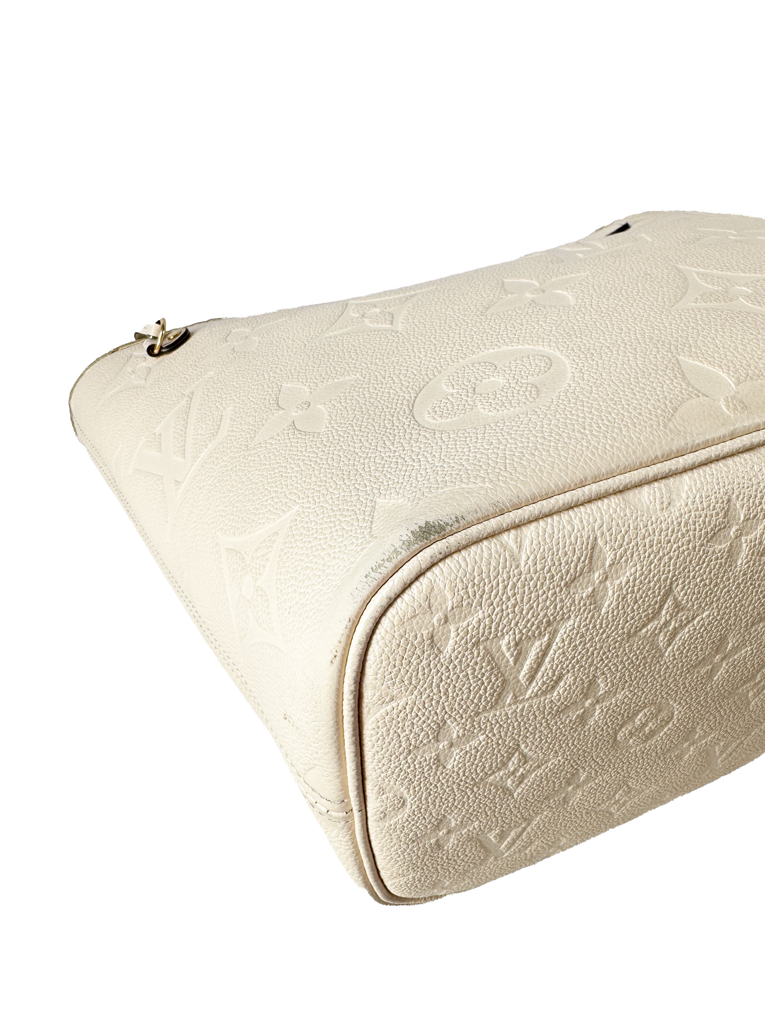 Louis Vuitton cream giant monogram empreinte Neverfull MM (NFC)