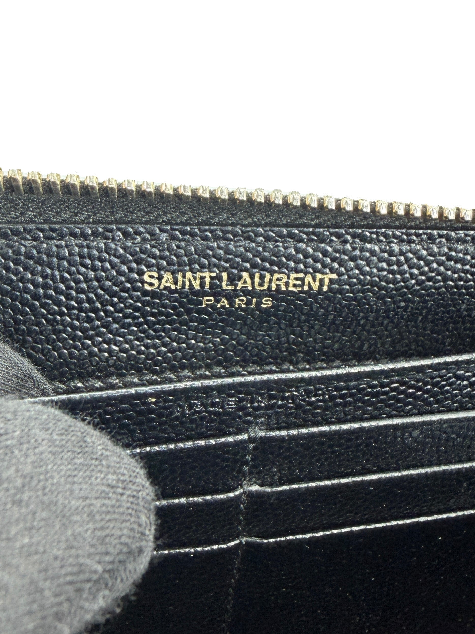 Saint Laurent black star motif leather zip around wallet HPP447985076