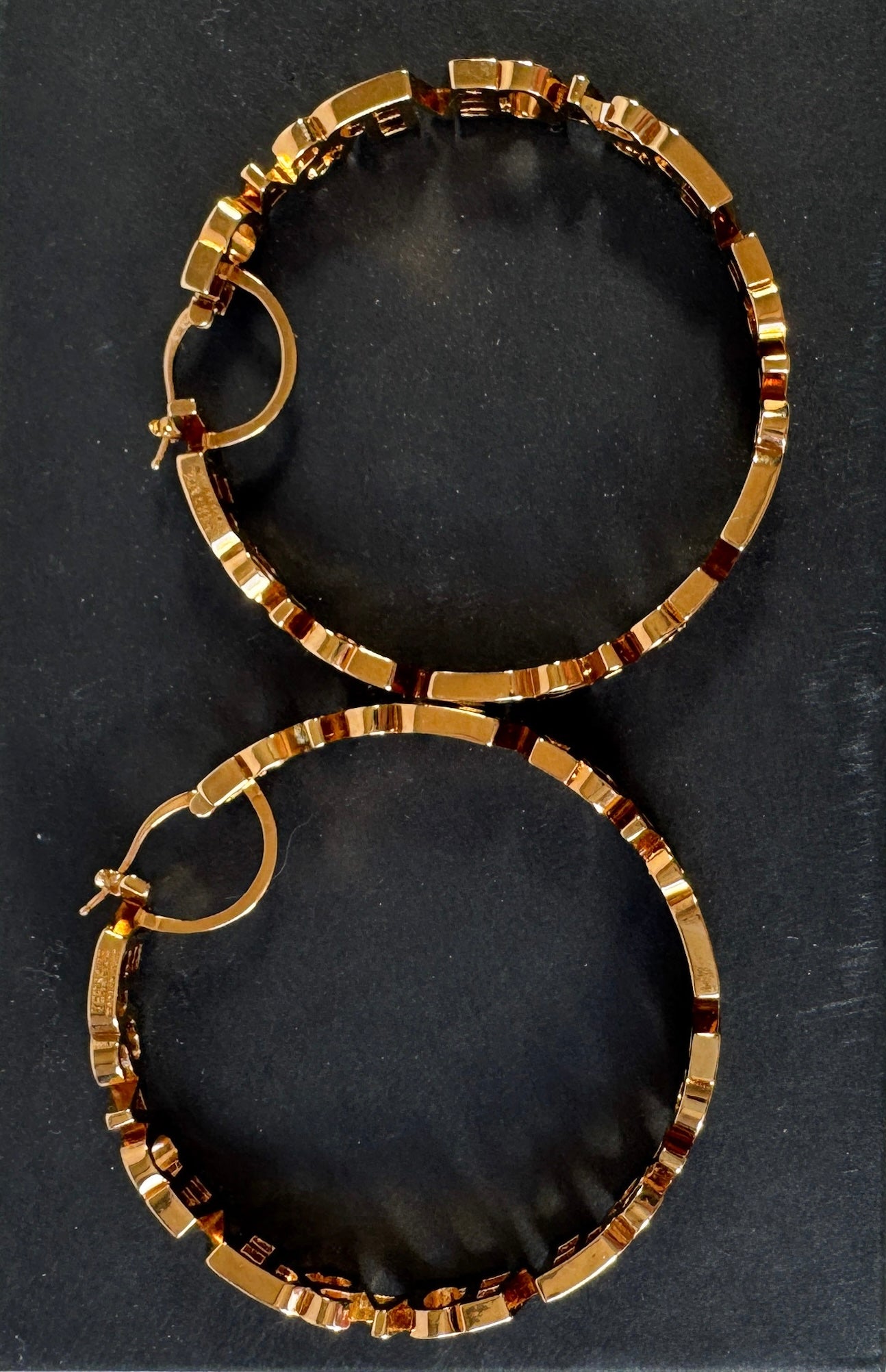 Versace logo gold tone hoop earrings retail $650