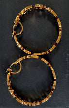 Versace logo gold tone hoop earrings retail $650