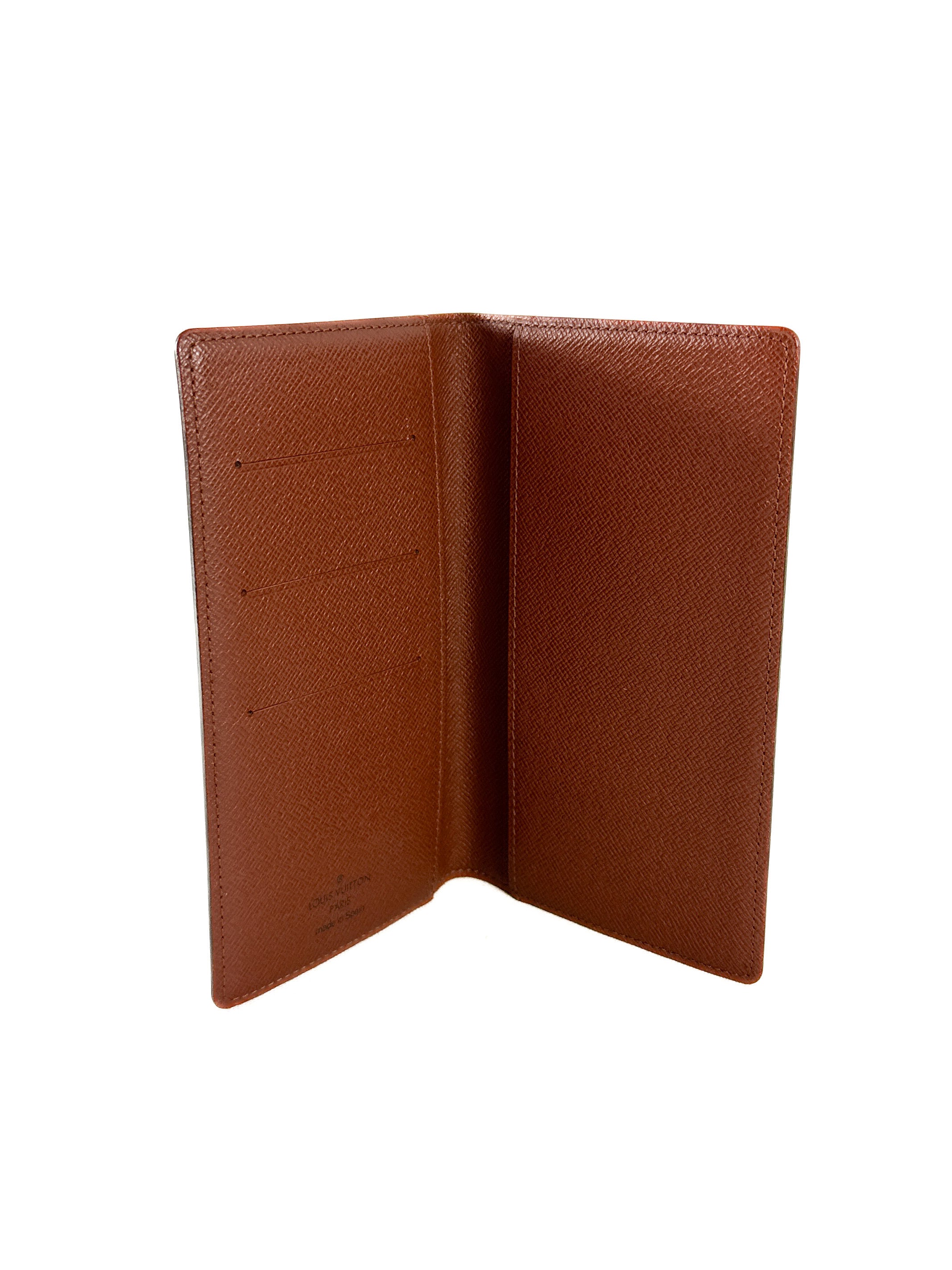 Louis Vuitton monogram vertical wallet CA0060