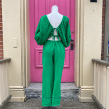 Aakaa green open back jumpsuit size Medium New With Tags