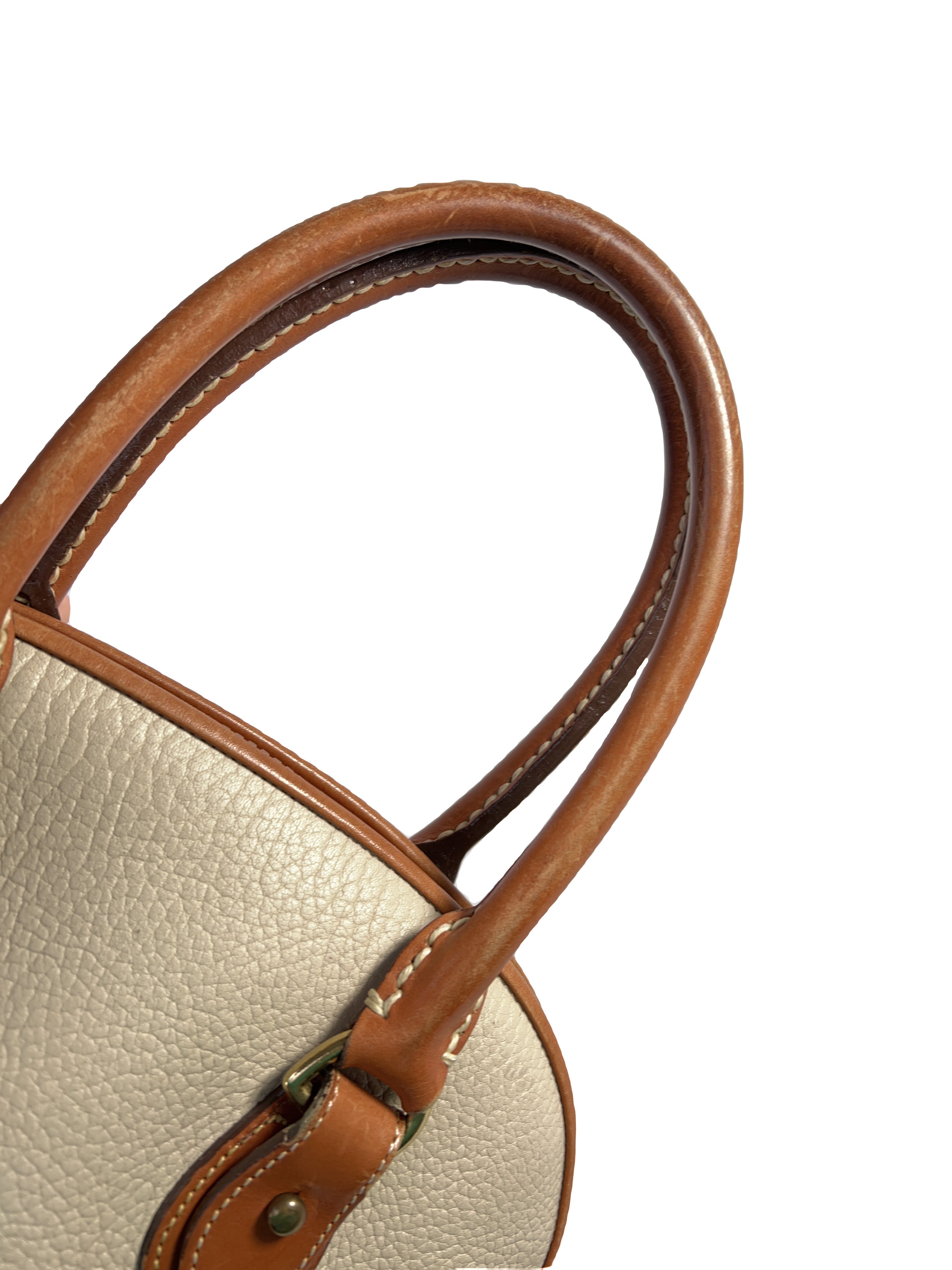 Dooney & Bourke cream and brown vintage leather domed satchel