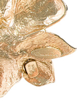 Oscar de la Renta gold tone flower clip on earrings