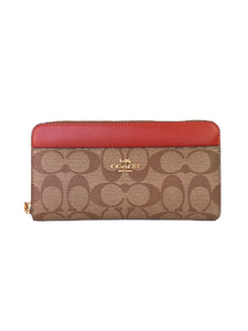 Coach brown and red leather coated canvas wallet