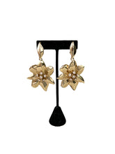 Oscar de la Renta gold tone flower clip on earrings