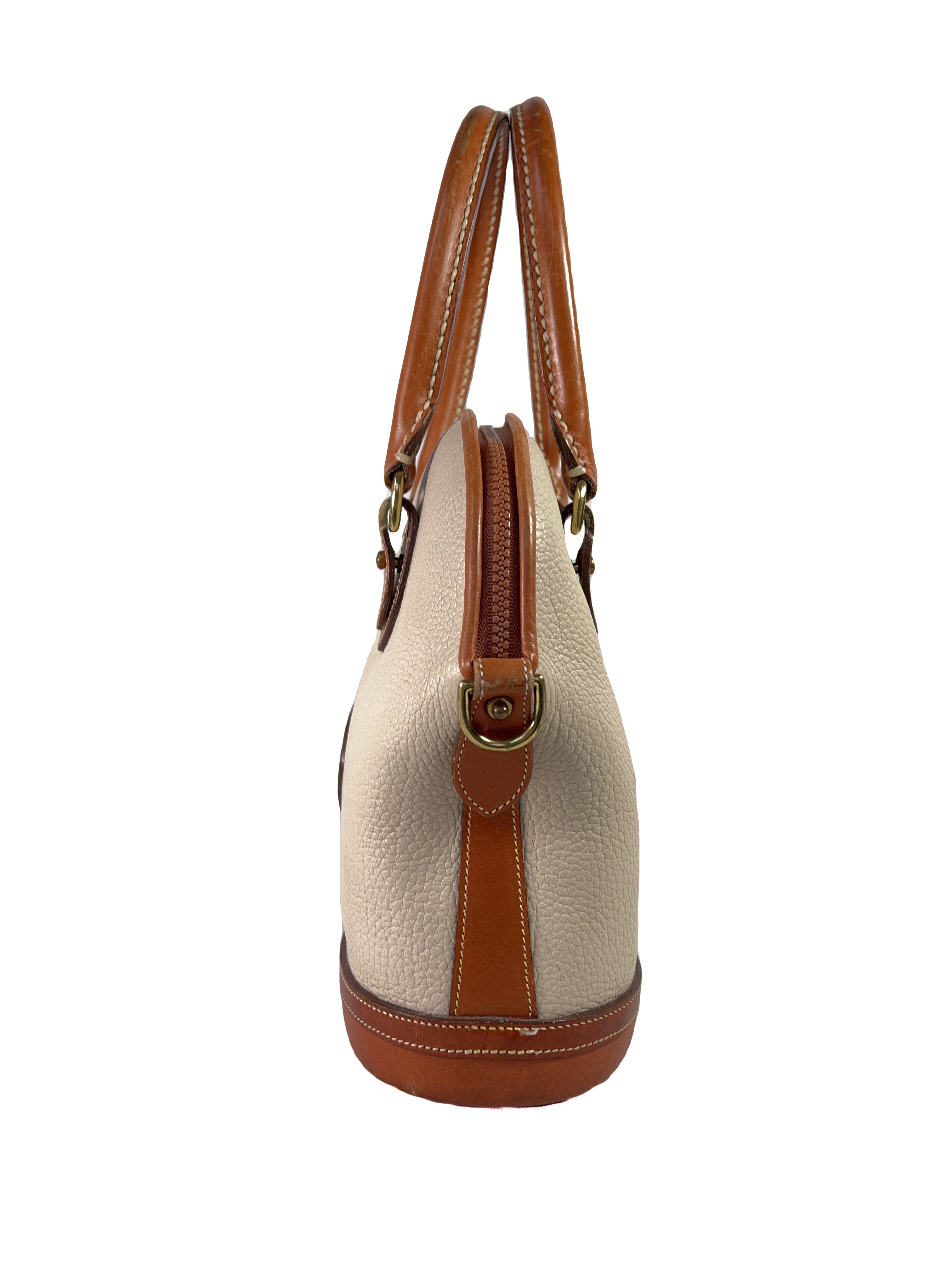 Dooney & Bourke cream and brown vintage leather domed satchel