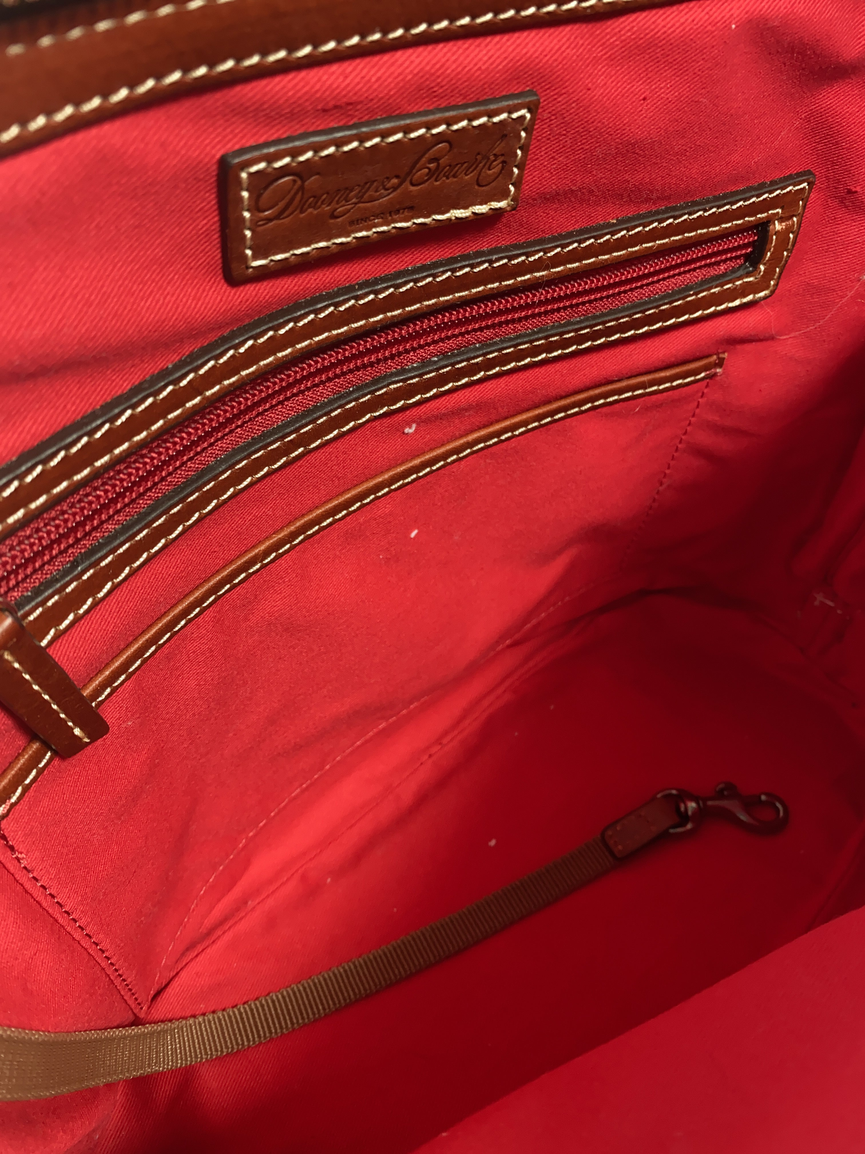 Dooney & Bourke purple and brown leather domed satchel