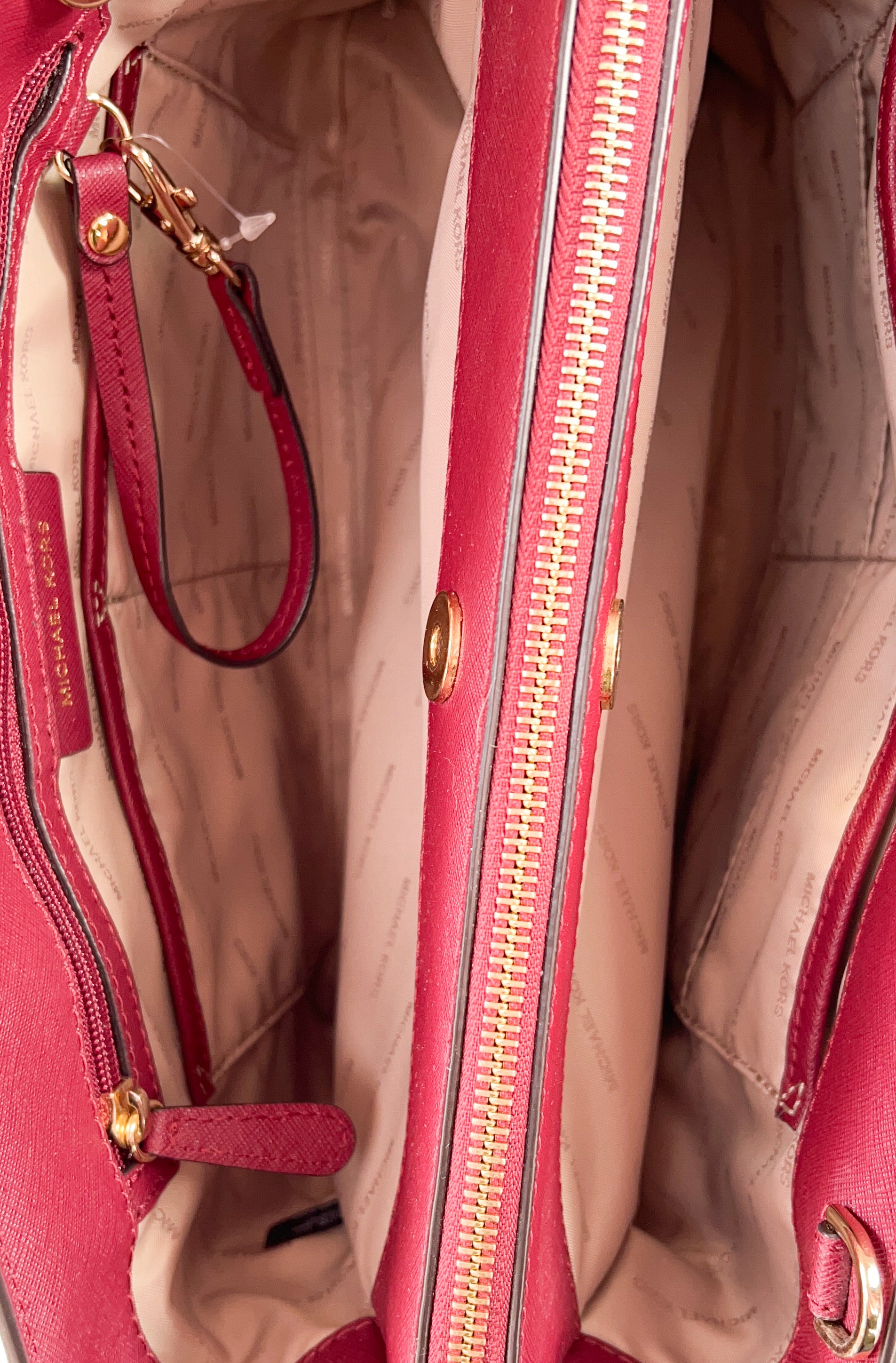 Michael Kors pink and burgundy leather satchel